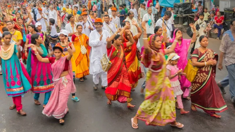 Hindu devotees dancing and chanting