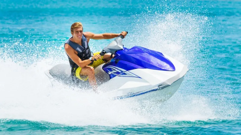 Sit On a Jet Ski and Drive Away into the Blue Sea